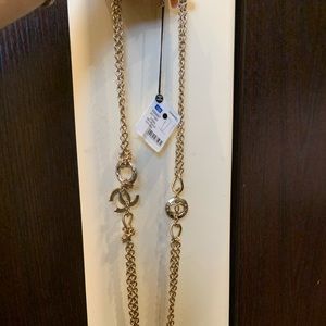 New with tags authentic Chanel gold long necklace